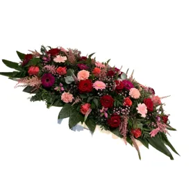 Pink flowers on a coffin Title «CityFlowers Dubai» in Dubai»
